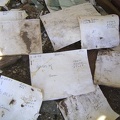 On the floor of the weigh station at the abandoned Aiken Mine lay old receipts and records bearing dates from the 1980s