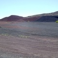 I return to the 10-ton bike and ride southwest across the red earth away to exit the Aiken Mine area