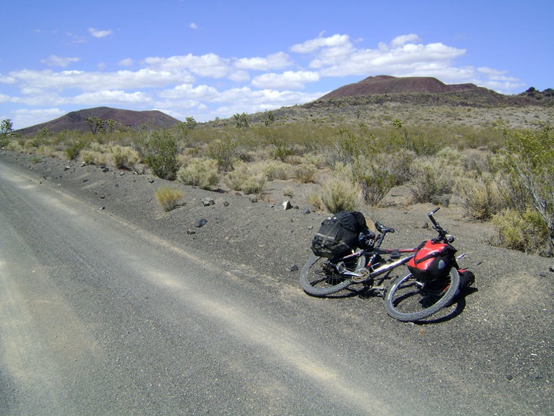 In little time, I'm well below Aiken Mine, which is up in the red hills above me here