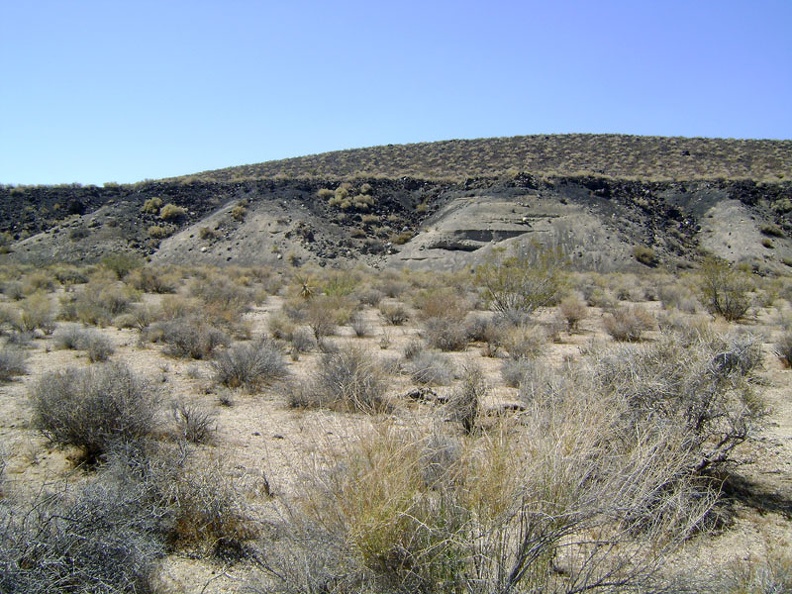 The road winds around another cinder-rock hill and I watch for a trail on my right leading to the Lava Tube, a known landmark