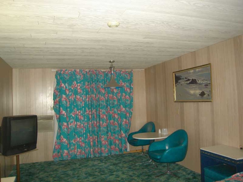 Pretty curtains and dinette suite in my room at the Royal Hawaiian Motel