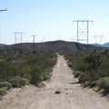 I ride down the powerline road a short distance and begin looking for a campsite; wow, the heat has really fried me today
