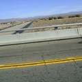 All packed up, I finally leave Baker and ride over the I-15 freeway and enter Mojave National Preserve in the brilliant sunshine