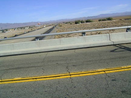 All packed up, I finally leave Baker and ride over the I-15 freeway and enter Mojave National Preserve in the brilliant sunshine