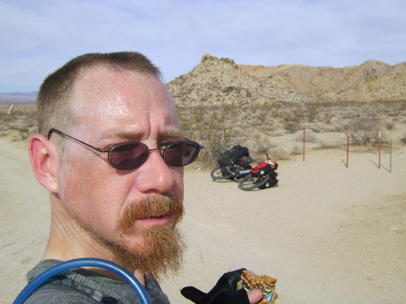 I take a break at Kelbaker Road's &quot;10-mile bend,&quot; entering the hills of Mojave National Preserve, sweating lightly