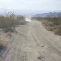 A group of dirt (motor)bikers catch up to me on a sandy stretch of the old Mojave Road and they stop for a chat