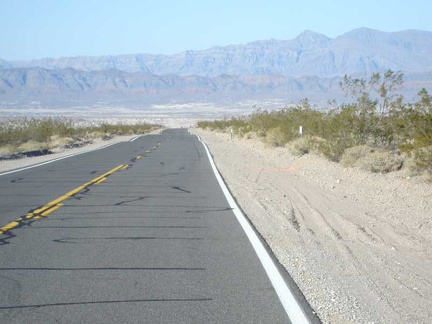 Highway 127 gets ready to drop down into the Tecopa Basin from the Ibex Pass summit