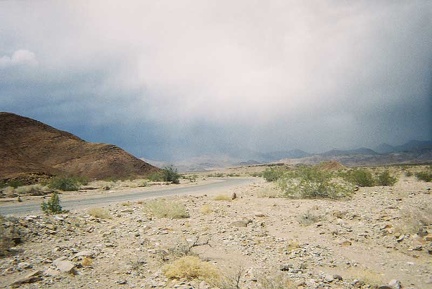 I'm getting a few raindrops from the clouds passing over the mountains ahead