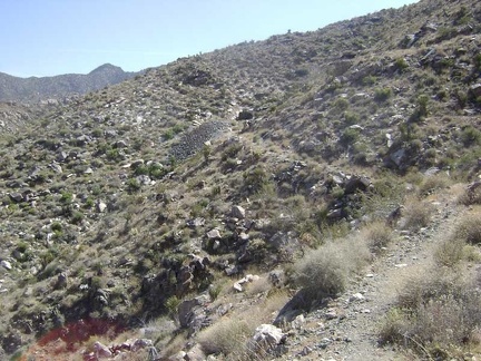 I come around a bend and it looks like the road will end at the mine tunnel and tailings pile ahead