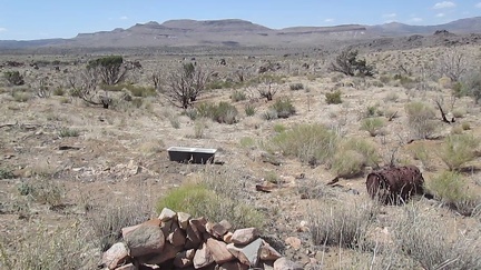 A bit of assorted debris is scattered around at the end of the Barnett Mine Road