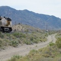 Another freight train passes by as I ride up Nipton-Moore Road, Mojave National Preserve