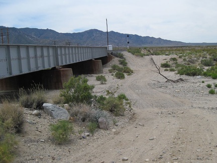 Nipton-Moore Road dips down to cross another drainage area just before it arrives at the paved Ivanpah Road