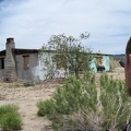 I park the 10-ton bike against the old house on Ivanpah Road and go for a walk around the property