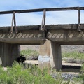 The 10-ton bike takes a break for a few minutes under the train tracks on the road leading up into the New York Mountains