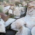 Water trickling down the rocks creates a small brook