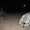 After dark, the moon rises in the background and I boil water for tonight's add-water-to-bag meal