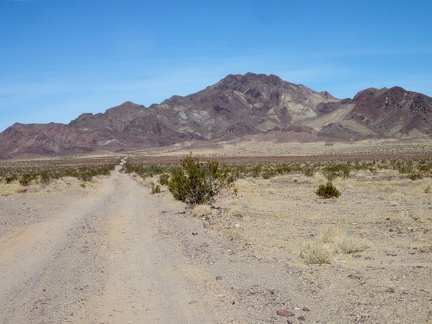 I'm just far enough down the dirt road now to have a panoramic view of the Sleeping Beauty peaks behind me