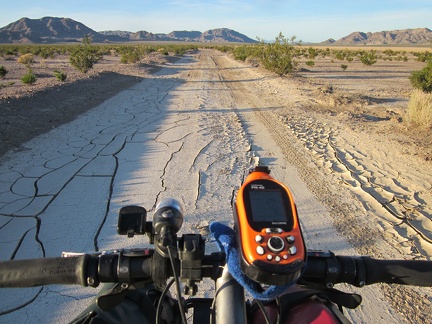 The clay soil on Crucero Road as it skirts the shore of Broadwell Dry Lake has big cracks