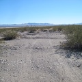 I continue hiking down the old road toward Broadwell Dry Lake and see some of my bicycle tracks from last night