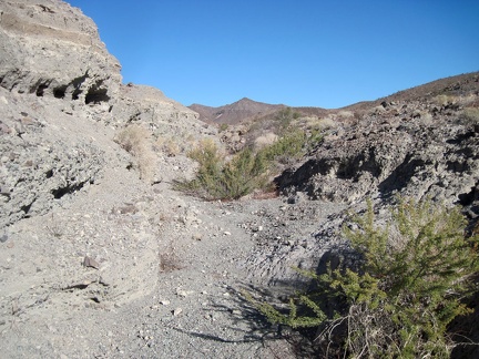 I decide to check out a narrow side wash that appears to run parallel to my route to the natural arch