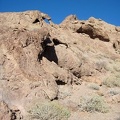 The Broadwell Natural Arch formation is full of eroded little caves in the rock