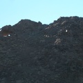 On the north side of the Broadwell Natural Arch formation, I notice a few holes in the rock that I didn't see earlier