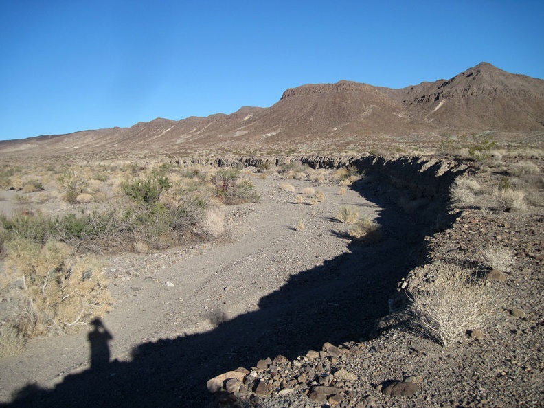 From the north side of Broadwell Natural Arch, I take one last look at the hike unhiked beyond