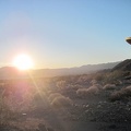 The cold sun starts to set behind the Cady Mountains on the far side of Broadwell Dry Lake
