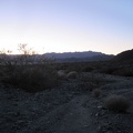 It's almost 17h, and a little sunlight still remains as I begin the hike back to camp across Broadwell Dry Lake
