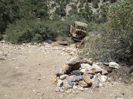 The road ends and I find a fire ring that hasn't been used for a while, and an abandoned truck