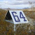 This road also serves as access to a gas pipeline, as evidenced by &quot;marker 64&quot; here