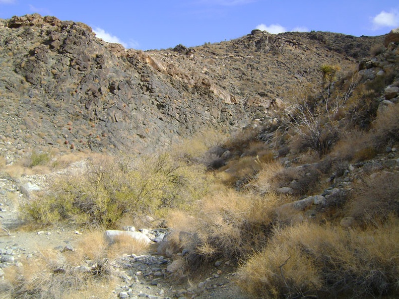 I finally start to enter the foot of the Granite Mountains in Bull Canyon