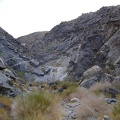 More rock ahead to climb over in middle Bull Canyon...