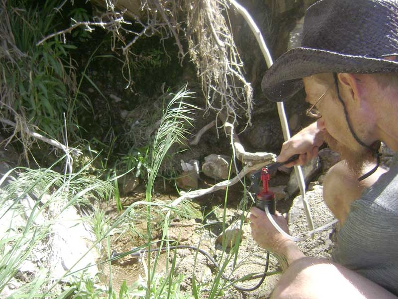 Filtering water from Cottonwood Spring, Mojave National Preserve