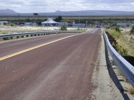 I ride down the bridge over I-15 and take a long break at the busy (it's Saturday) Valley Wells gas station store