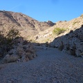 Above the little dry waterfall is easy walking on gravel below the Cady Mountains peaks