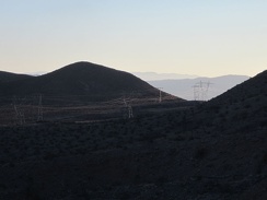 The power lines crossing the pass in the Cady Mountains pick up the end-of-day sunlight quite sculpturally