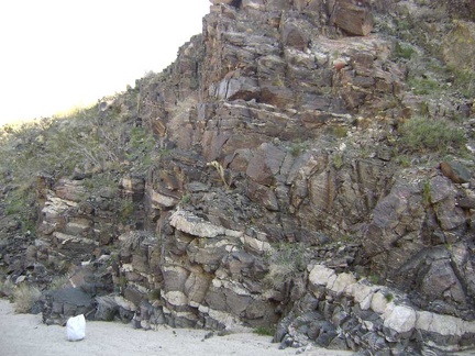 With no set destination, I start walking up the wash past Indian Springs and notice some intriguing rock layers