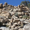 Rock piles along the wash attract my attention