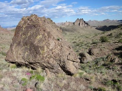 A few nice rock outcrops dot the hike down the wash into the valley below the Castle Peaks