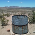 This old water tank on Cave Spring Road is dry and shot-up, but has great views over to the Woods Mountains