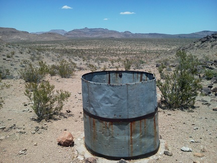 This old water tank on Cave Spring Road is dry and shot-up, but has great views over to the Woods Mountains