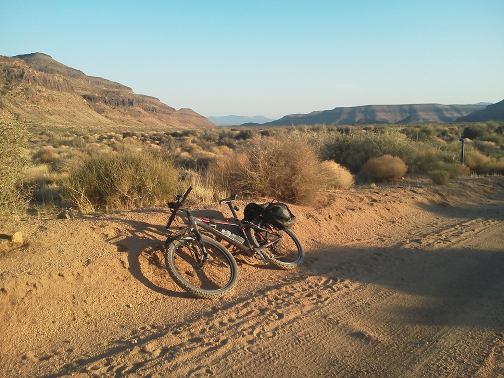 Great views behind me of Woods Mountains (left) and Wild Horse Mesa as I ride back to camp