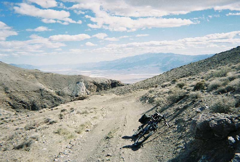 I park the bike and go for a walk up the big hill to my right to take in the views of Death Valley below