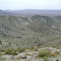 Looking south from the unnamed ridge above Copper World Mine toward Cima Dome on the horizon