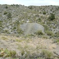 I reach the bottom of the hill and start walking up the road toward the Copper World Mine site