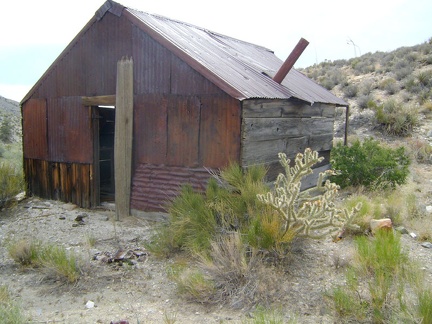 The back side of the cabin near Copper World Mine