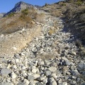 The soil on this steep stretch of Cornfield Spring Road has eroded over decades, leaving just a trail of rocks