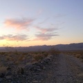 Walking down Cornfield Spring Road toward Kelso at sunset, Mojave National Preserve