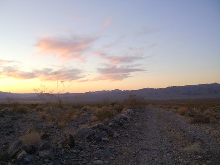 Walking down Cornfield Spring Road toward Kelso at sunset, Mojave National Preserve